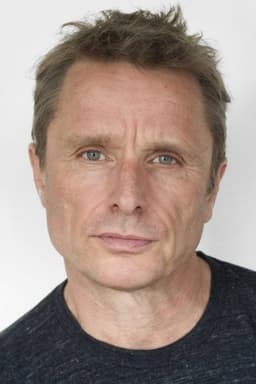 Dikran Tulaine headshot