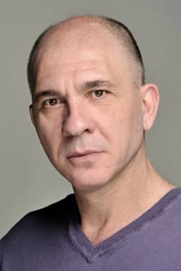 Darío Grandinetti headshot